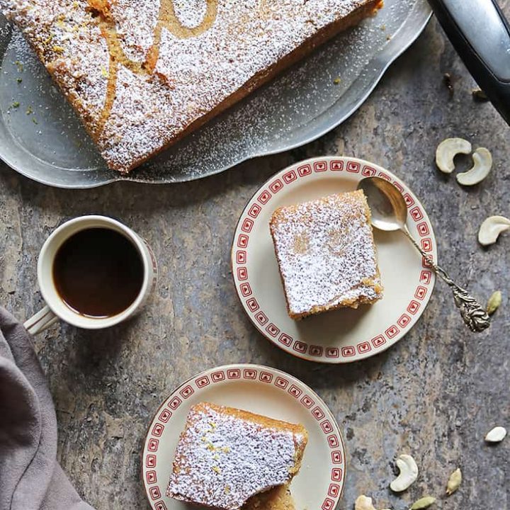 Small-batch eggless Sri Lankan Love Cake Recipe on two plates and a serving platter with a cup of coffee.