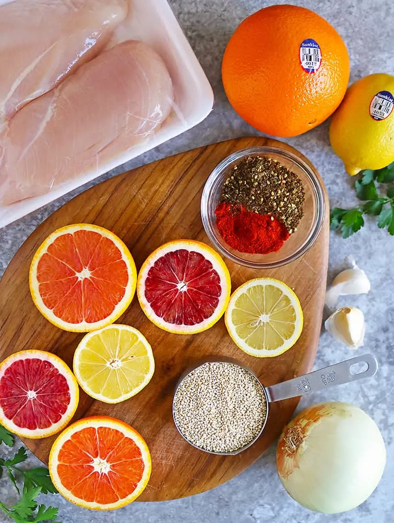 Overhead photo of Ingredients to make healthy citrus chicken quinoa dinner