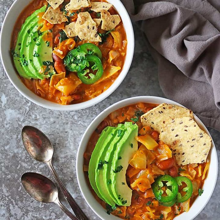 Two bowls of melt in your mouth vegan cabbage soup with beans.
