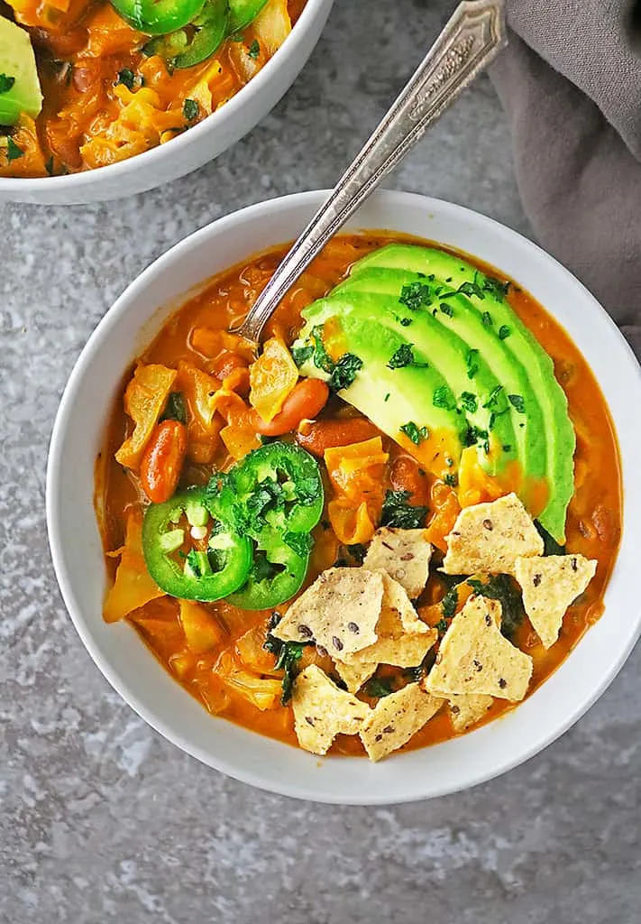 a bowl of Easy vegetarian cabbage soup with beans - a comforting and cozy wholesome soup.