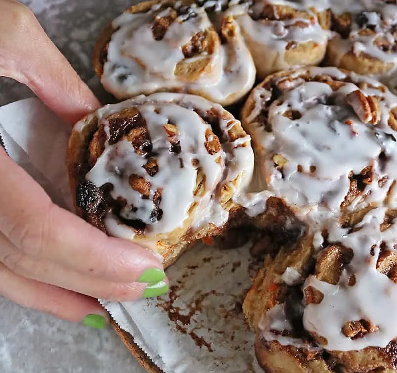 Grabbing an eggless Carrot cake cinnamon roll.