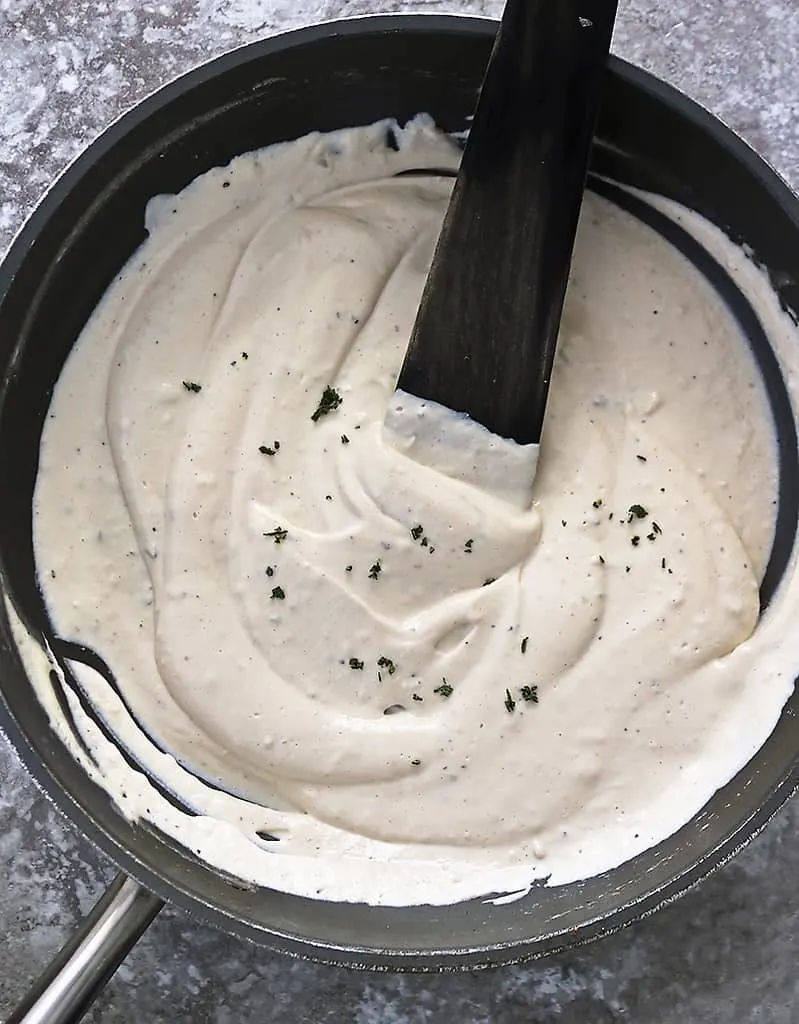 Pan with thickened Plant Based Creamy Sage Sauce.