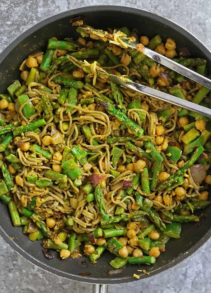 Making plant-based curry noodles for dinner