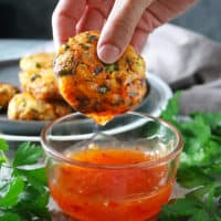 Air fried easy veggie fritters dipped into Franks RedHot sweet chili sauce.