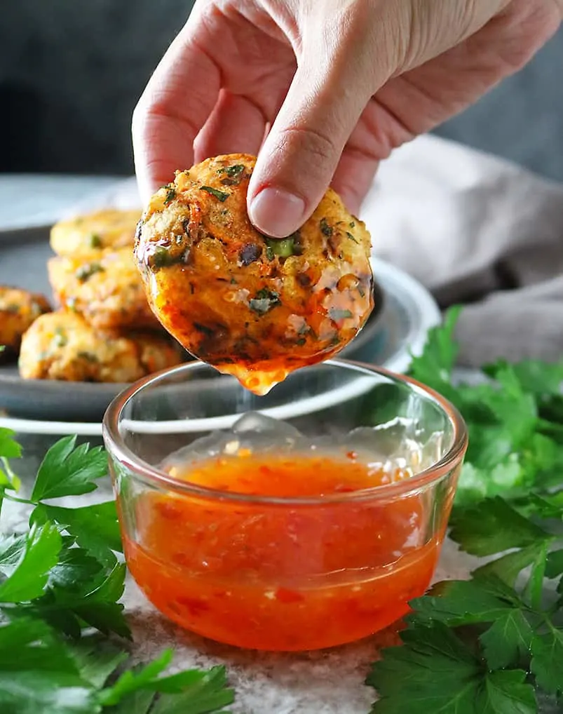 Air fried easy veggie fritters dipped into Franks RedHot sweet chili sauce.