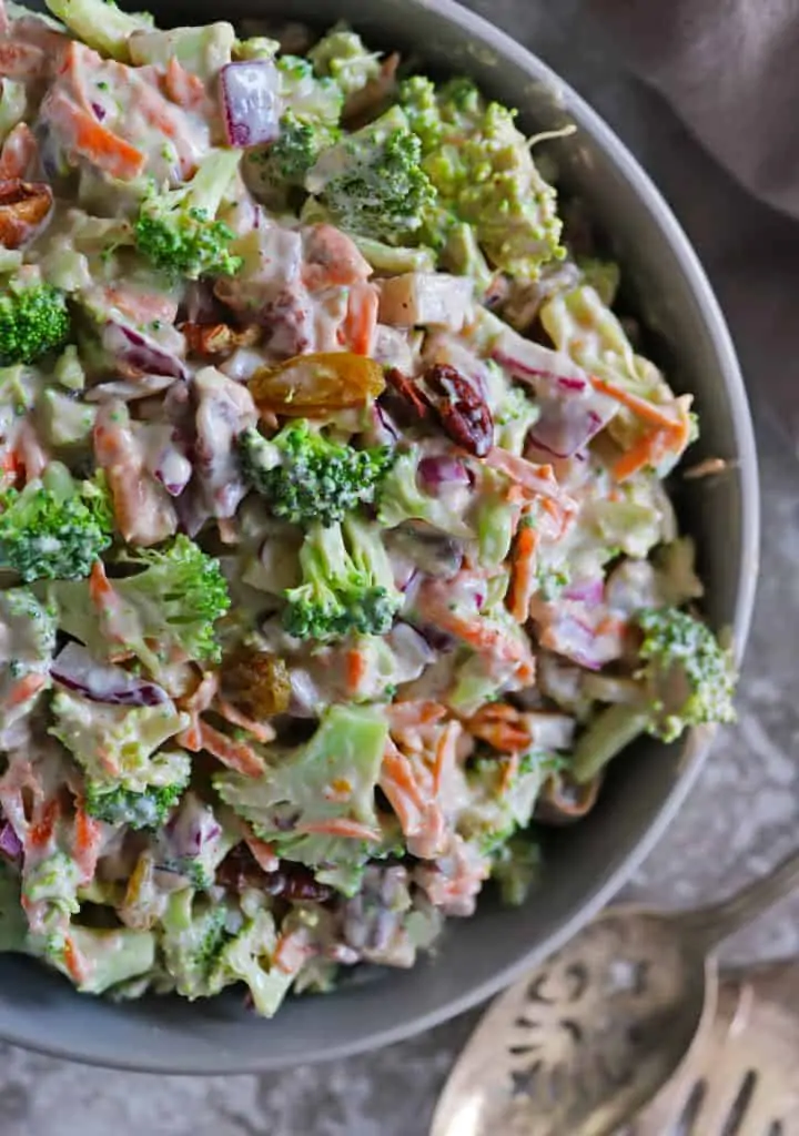 A big bowl with delicious easy healthy vegan broccoli salad recipe