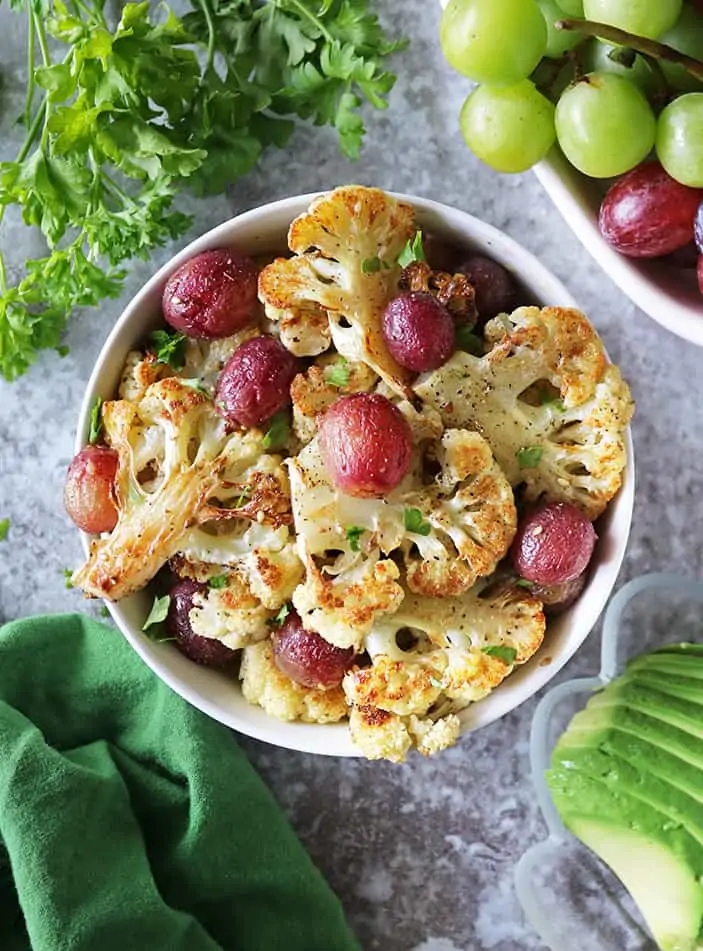 Roasted Cauliflower and Grapes with Zataar in a large bowl.