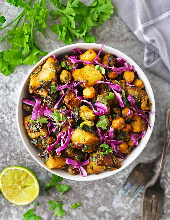 Tasty Easy One Pot Chickpea Potato Spinach Sauté in a large bowl.