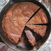 Delicious easy grain-free chocolate peanut butter skillet cake.