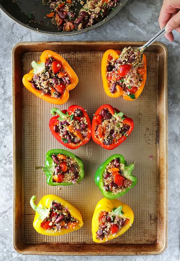 Stuffing bell peppers with quinoa bean mix