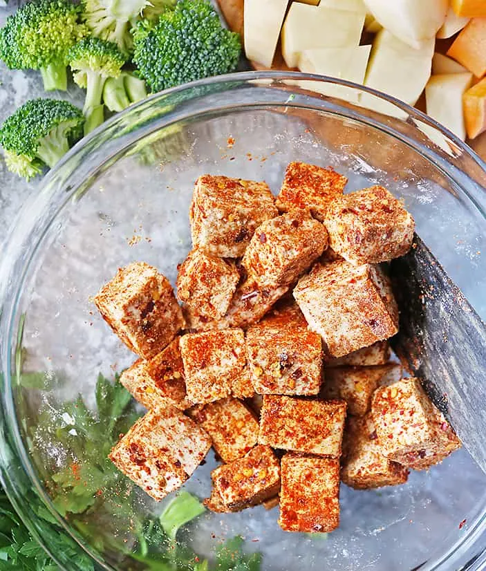 Tofu seasoned with spices and arrowroot powder for the best crispy baked tofu.