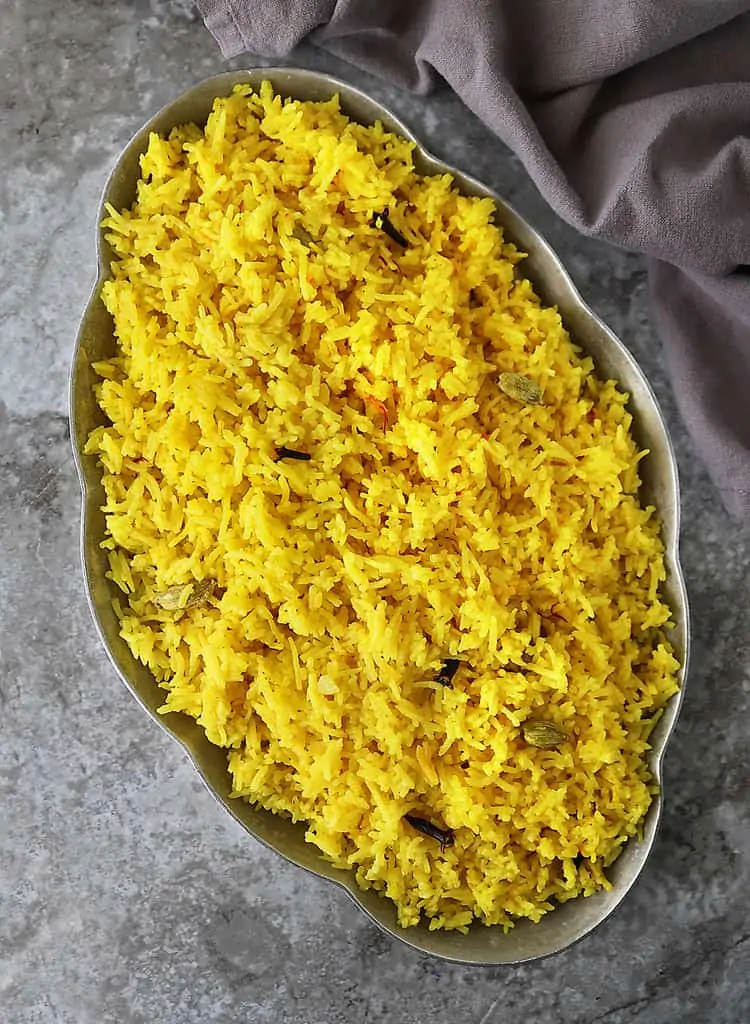 A large platter of buttery garlic Yellow rice warm and delicious