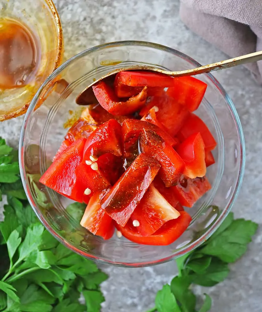 coating bell pepper with ras el hanout cayenne mixture