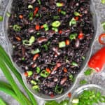 Easy Black Rice and Beans Recipe on a grey platter.