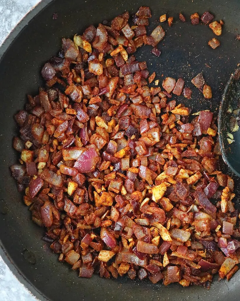 Sauteing onions to make purple sweet potato soup