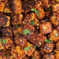 This lightly crispy Maple Chili Tofu is a delightful blend of sweet and spicy.