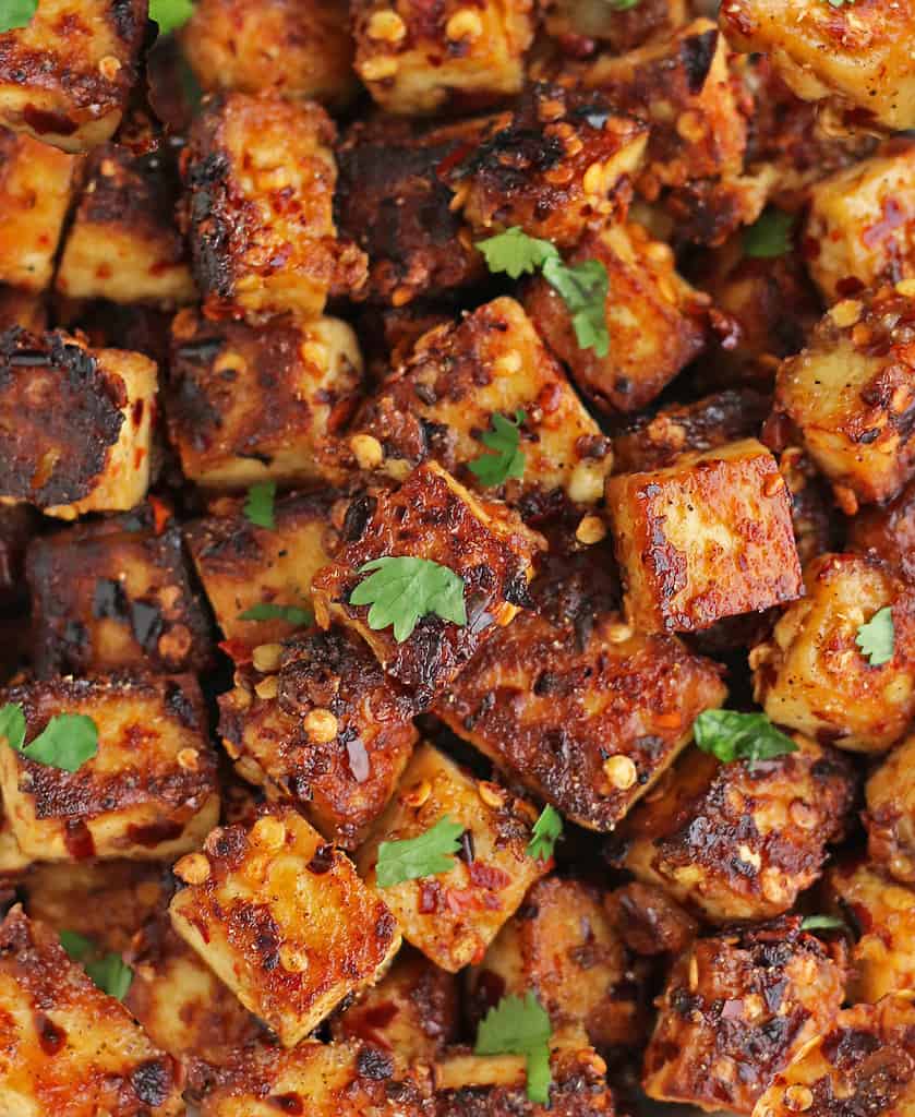 This lightly crispy Maple Chili Tofu is a delightful blend of sweet and spicy.