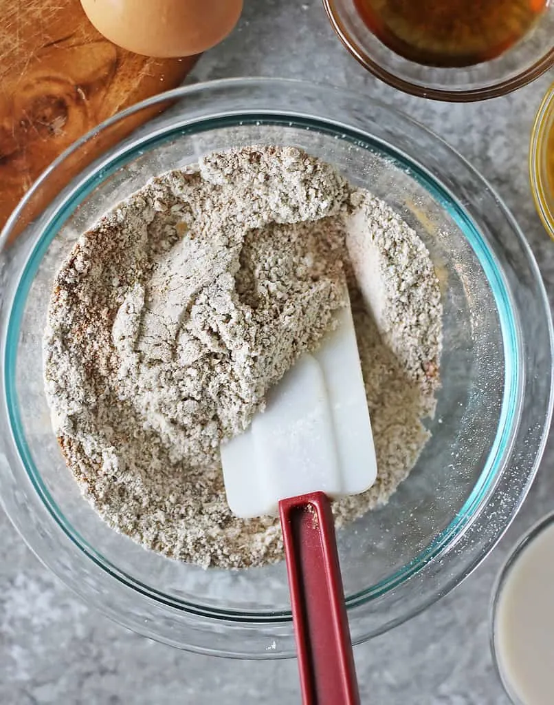 Mixing together the dry ingredients to make these healthy waffles