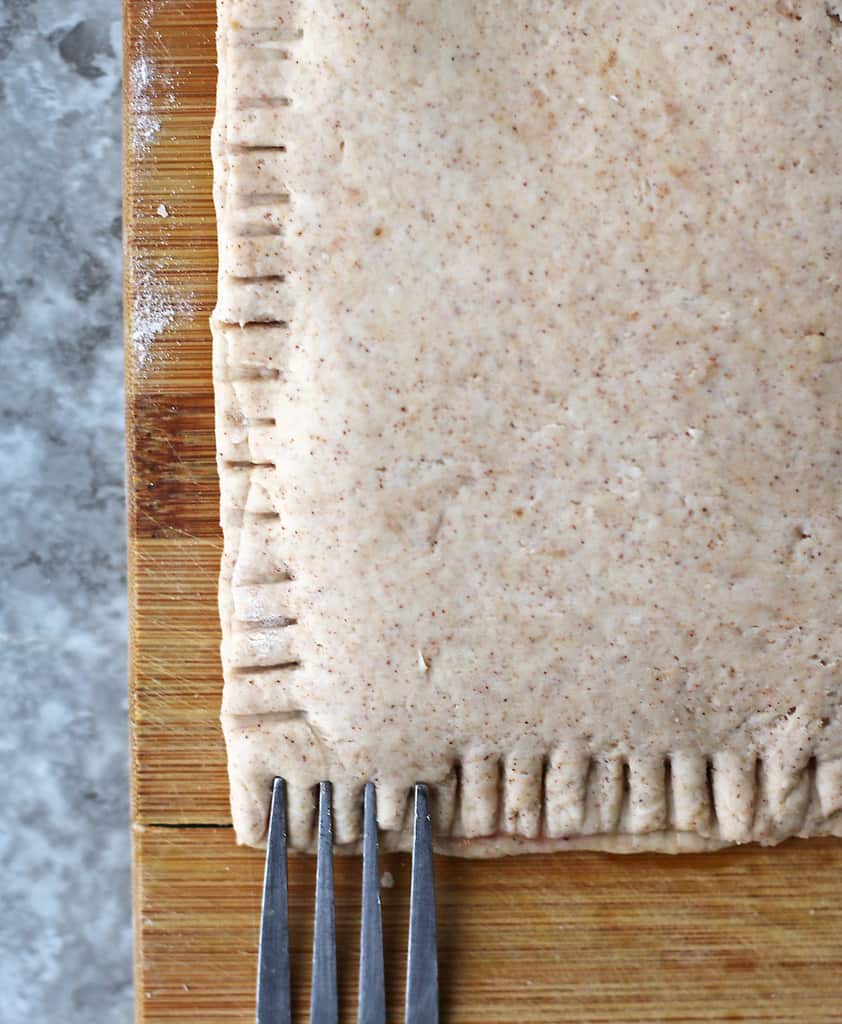 Crimping the edges of easy pop-tart dough