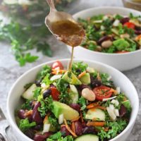 Three bean chopped salad with balsamic vinaigrette drizzled on