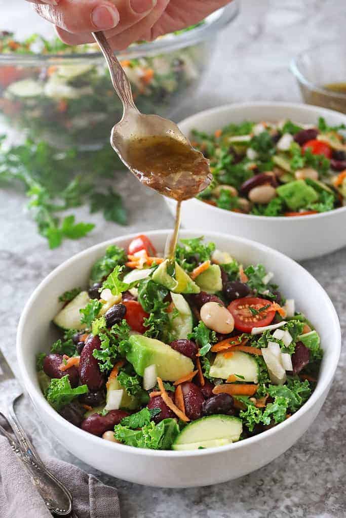 Three bean chopped salad with balsamic vinaigrette drizzled on