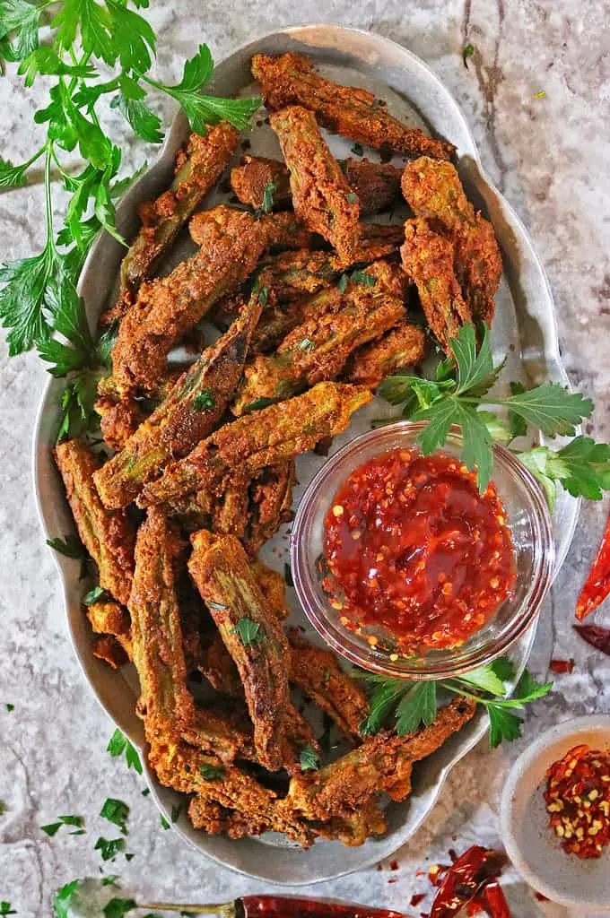 Easy Oven baked okra in a silver serving tray