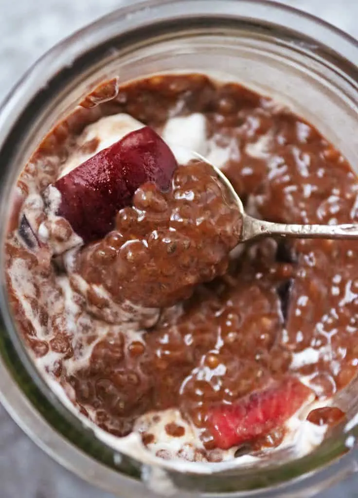 Mixing together cocoa chia milk cherries