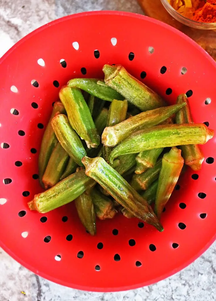 Rinsing frozen okra to prep