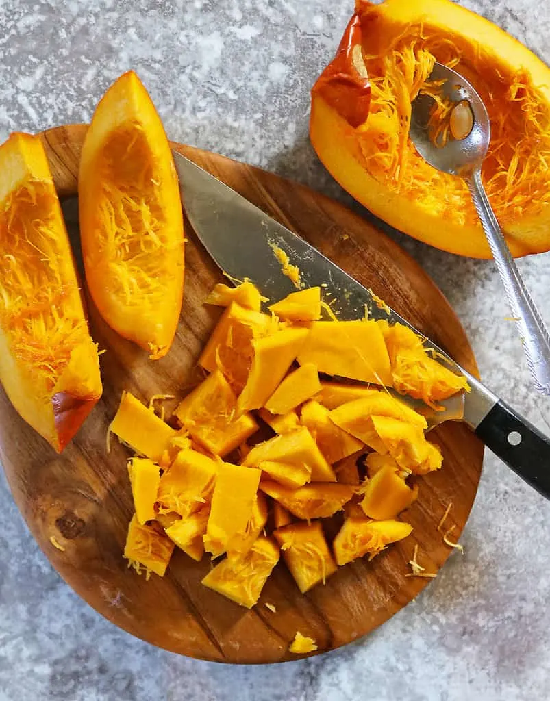 Cutting up a baked pumpkin