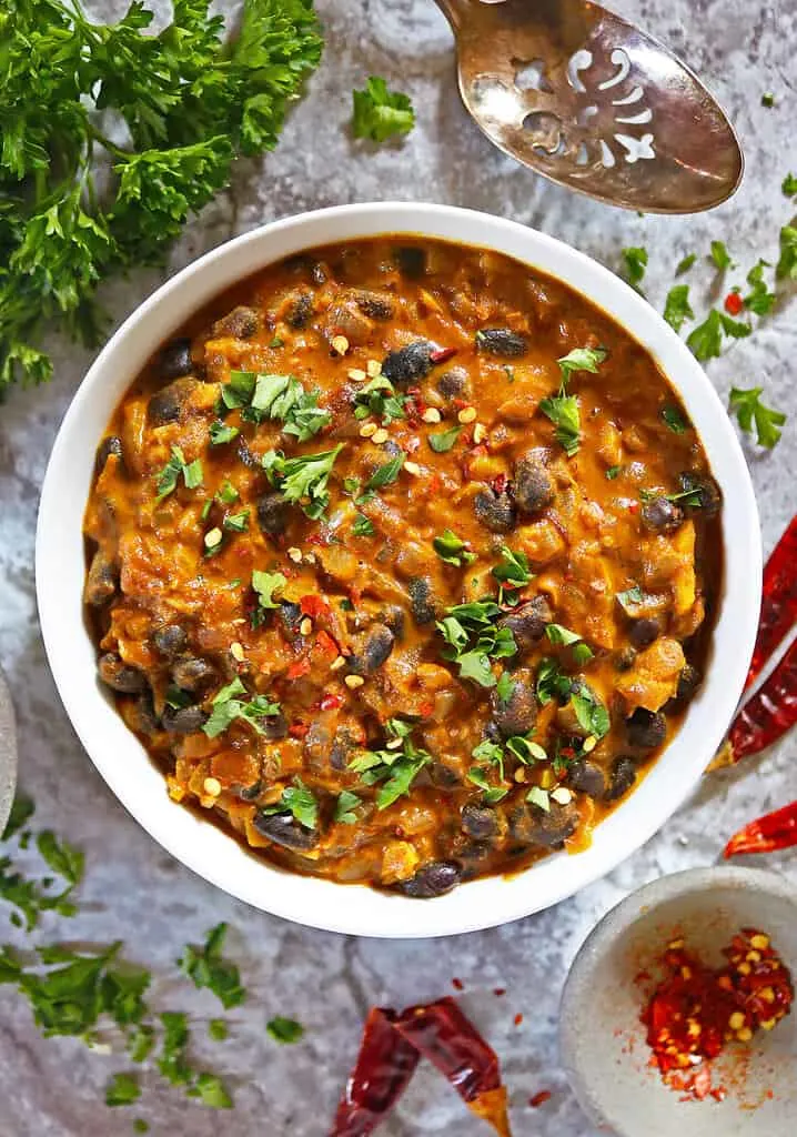 Spicy coconut broth with black beans