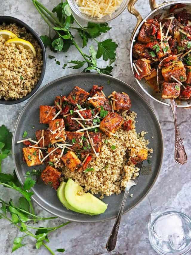 Marry-Me-Tofu with Zaatar Lemon Quinoa Dinner on marble background