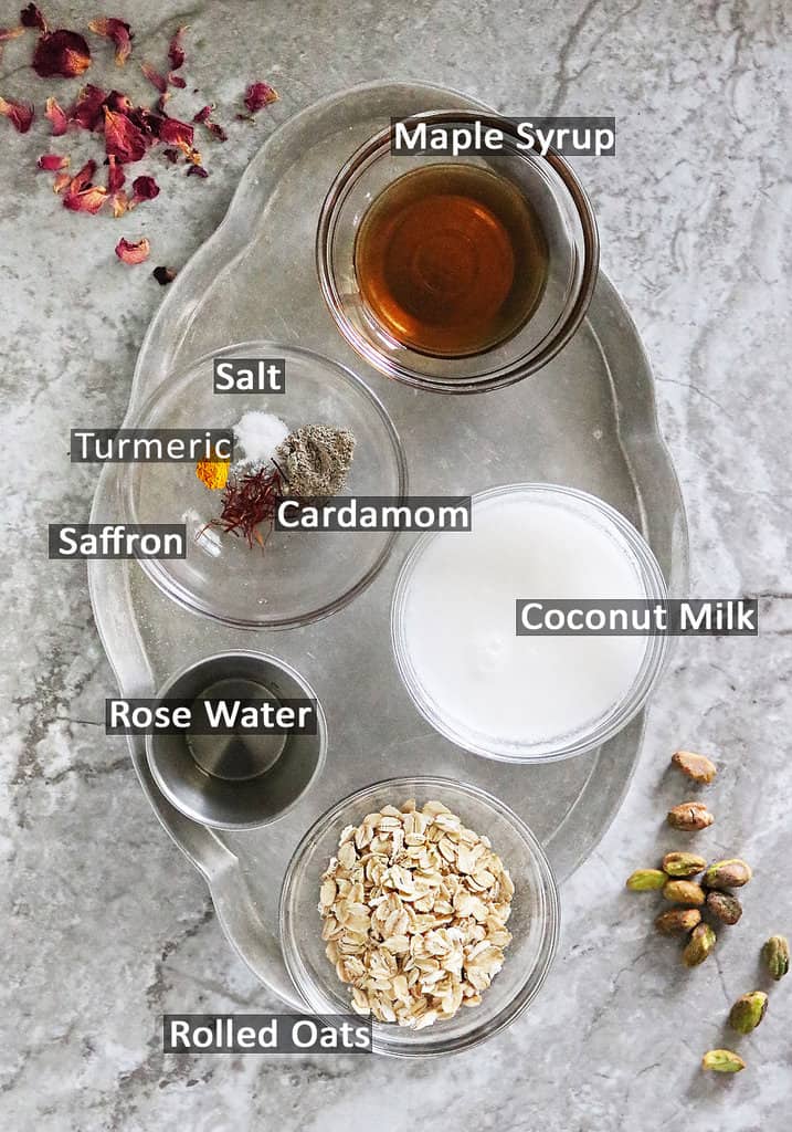 7 Ingredients to make Oat Pudding on a silver platter