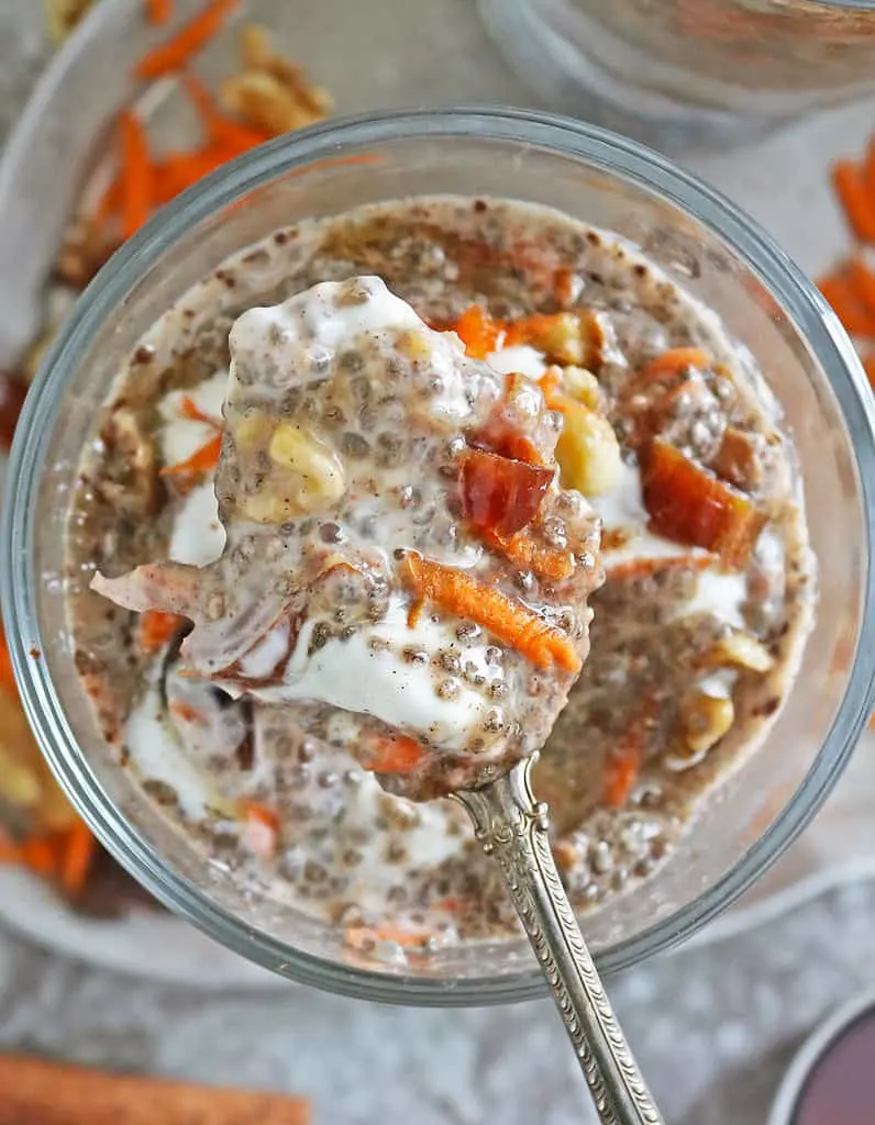 Enjoying a large spoonful of carrot cake chia pudding