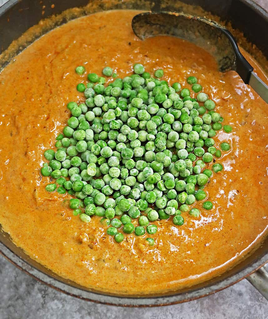 Adding frozen peas to coconut curry