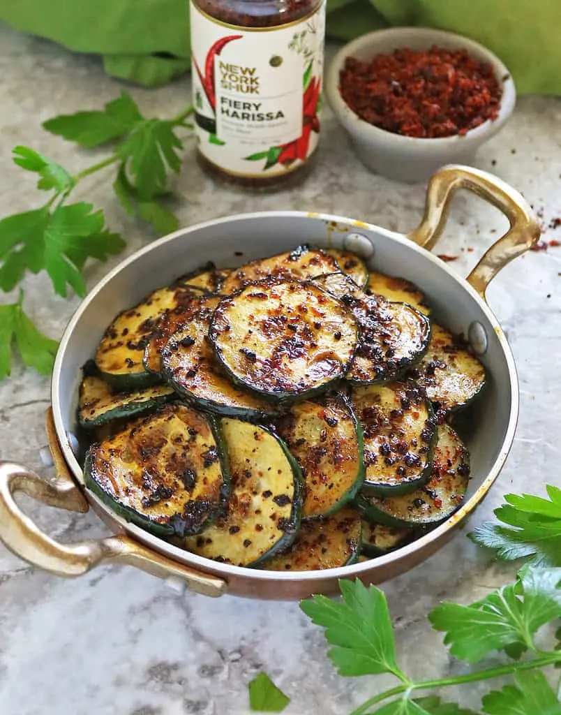 Easy panfried cucumbers made with New York Shuk Fiery Harissa