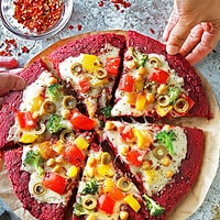Easy and tasty gluten-free, refined sugar-free beet pizza crust is stunning to look at and sure to be a hit with friends and family.