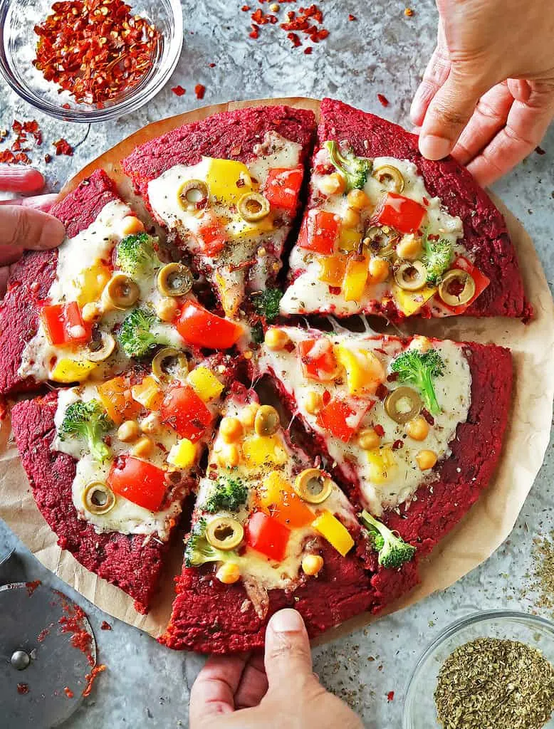Easy and tasty gluten-free, refined sugar-free beet pizza crust is stunning to look at and sure to be a hit with friends and family.