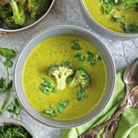 A bowl of warm Vegetarian broccoli spinach soup.
