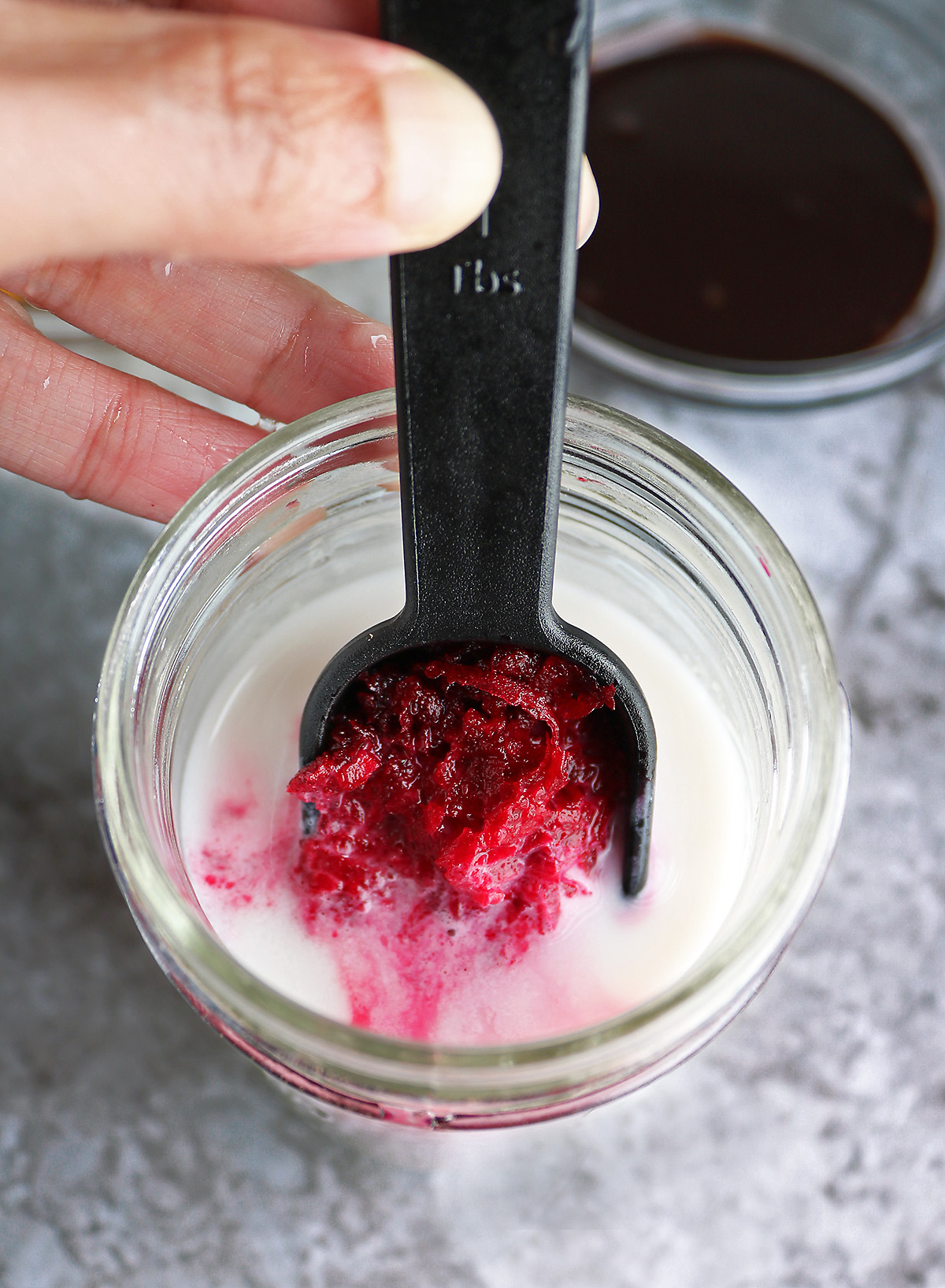 Adding grated beetroot to almond milk