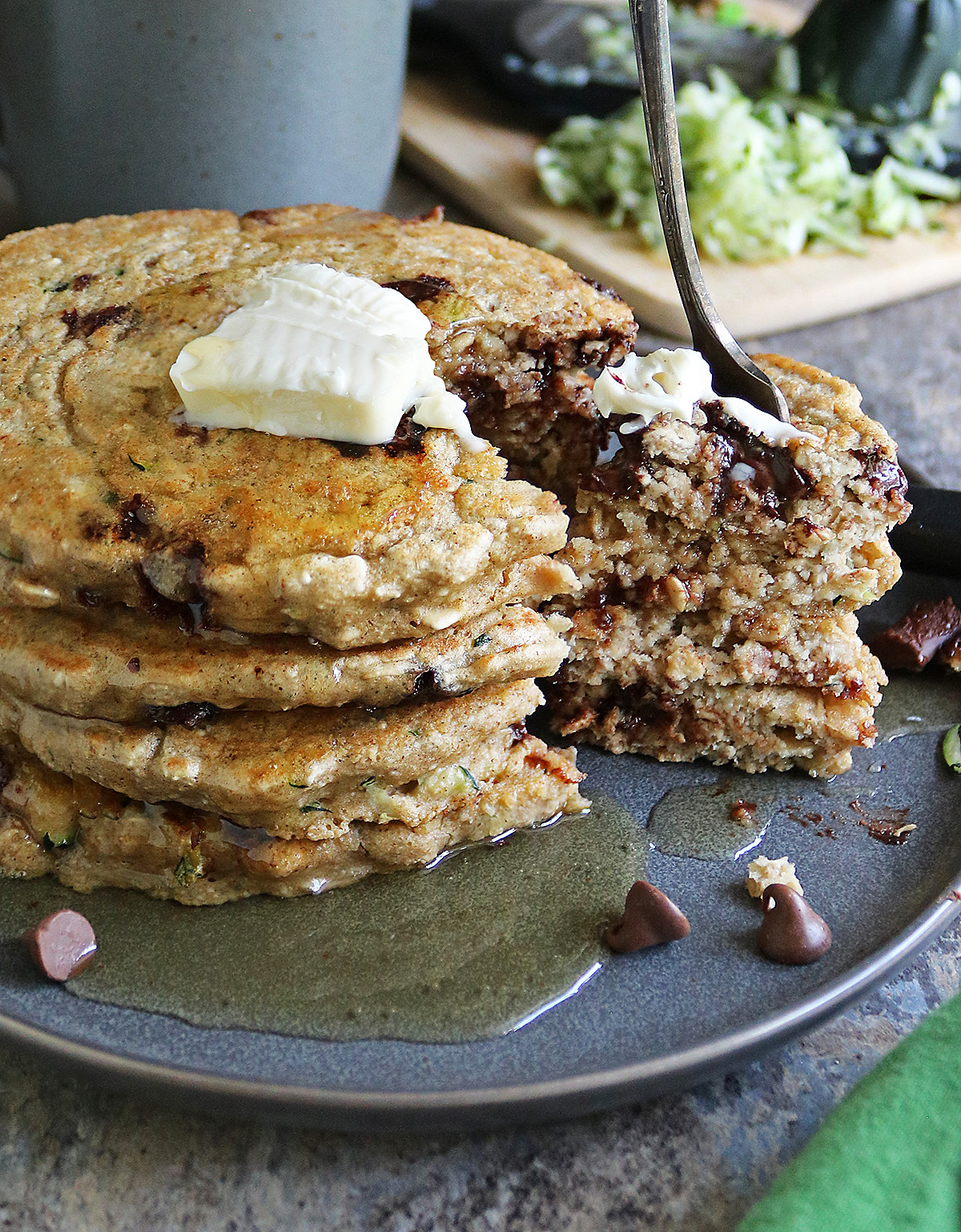 Enjoying a forkful of these Delicious Oat Zucchini Chocolate Chip Pancakes.