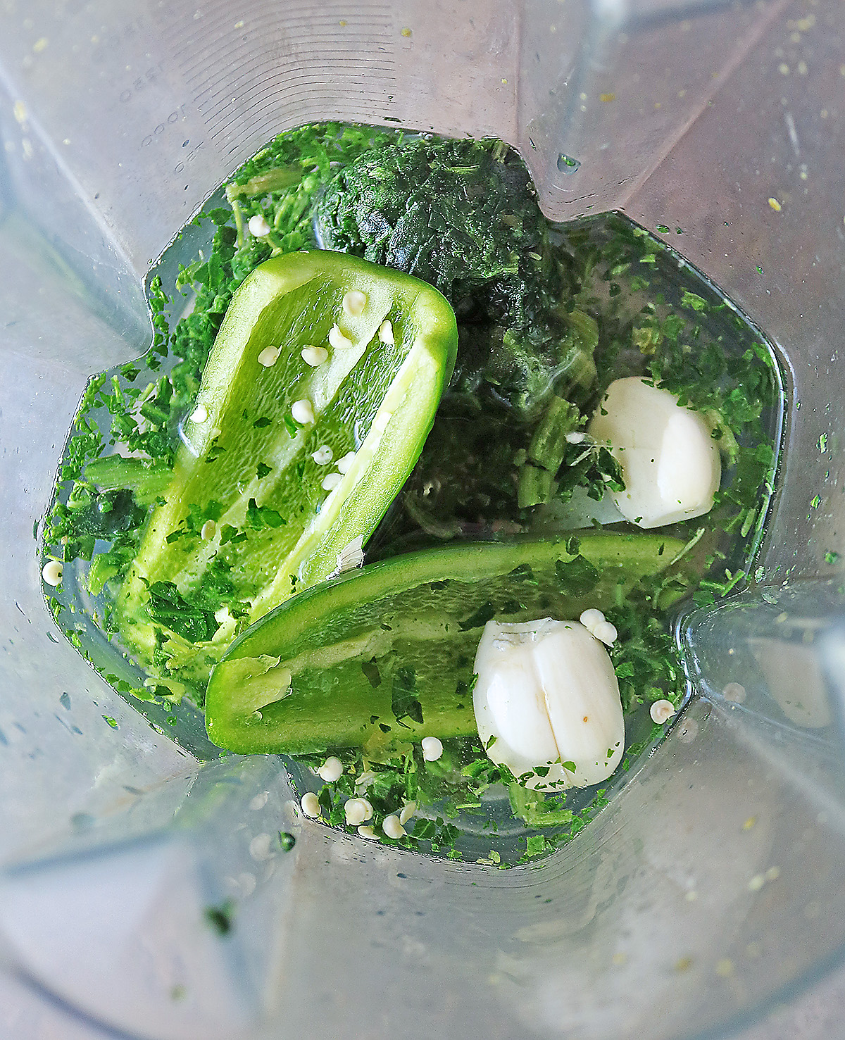 Making a tasty green broth to cook rice in.