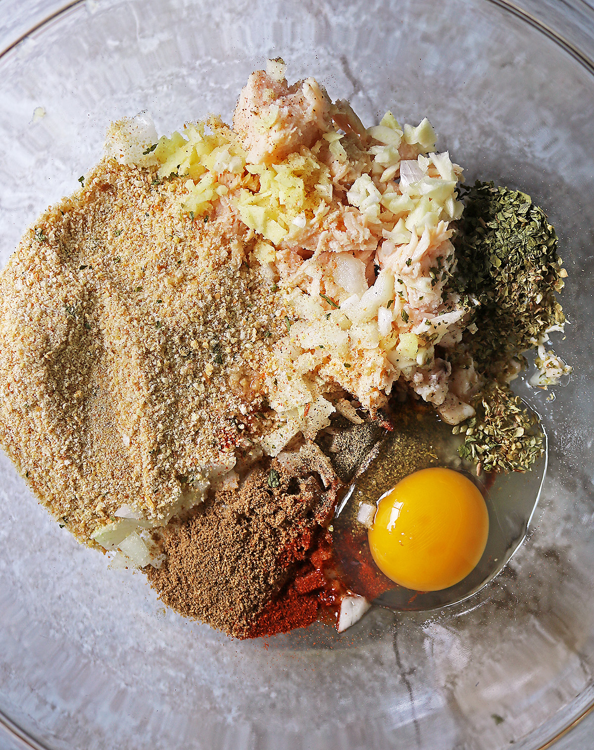 Adding all the ingredients to a bowl.