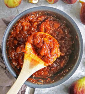 Stirring fig chutney to cool it down a bit