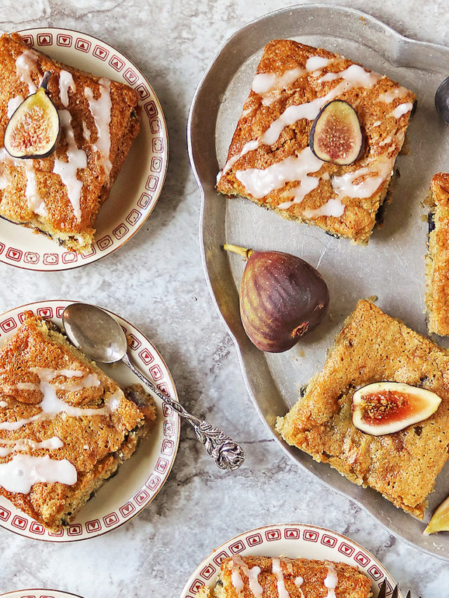 Tasty fig cake slices ready to be enjoyed on single serve plates.