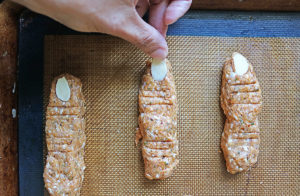 Adding fingernails onto chicken fingers