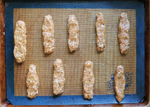 Shaping the chicken into fingers