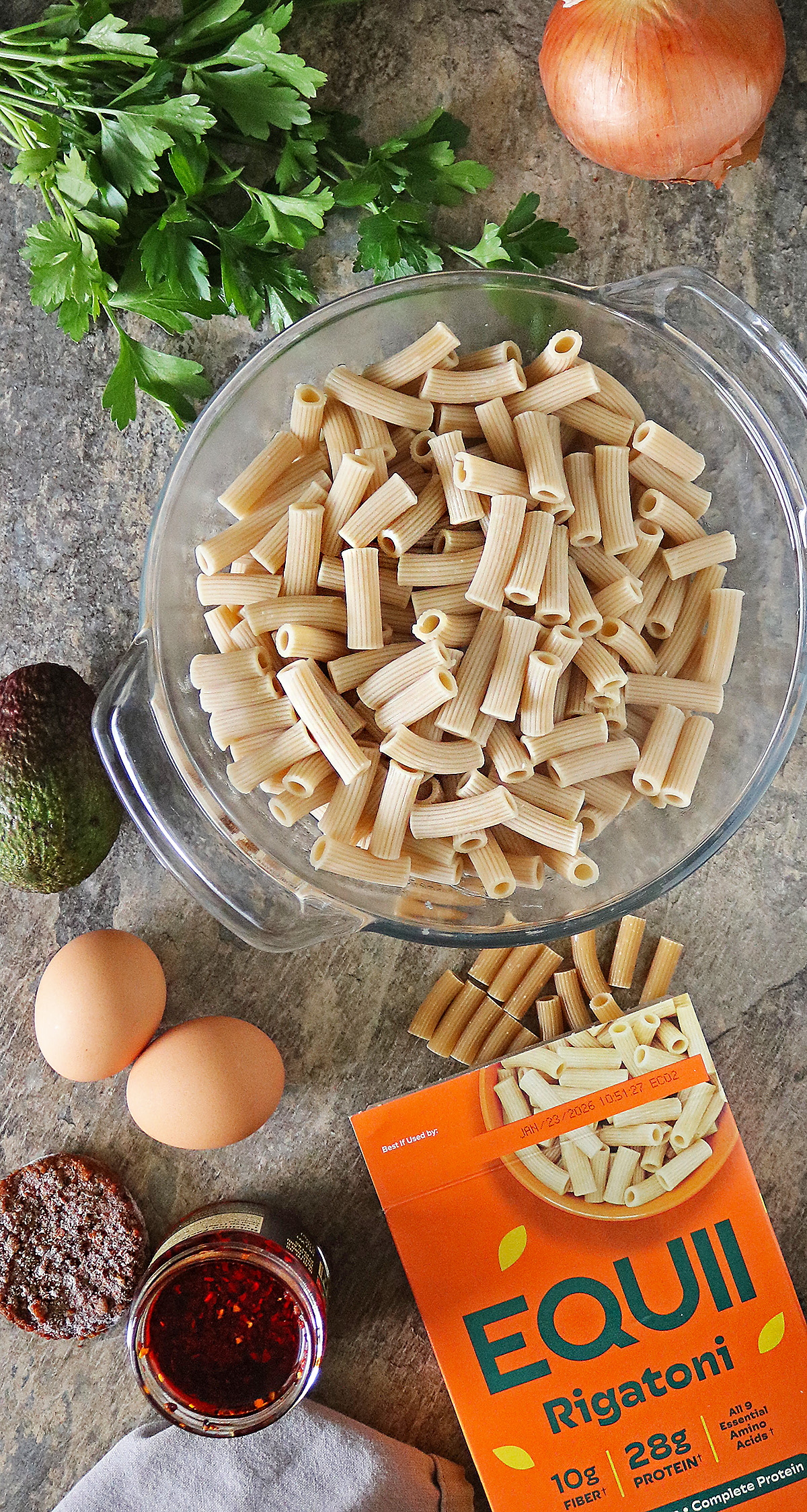 Overhead view of the 9 Ingredients needed to make breakfast pasta.