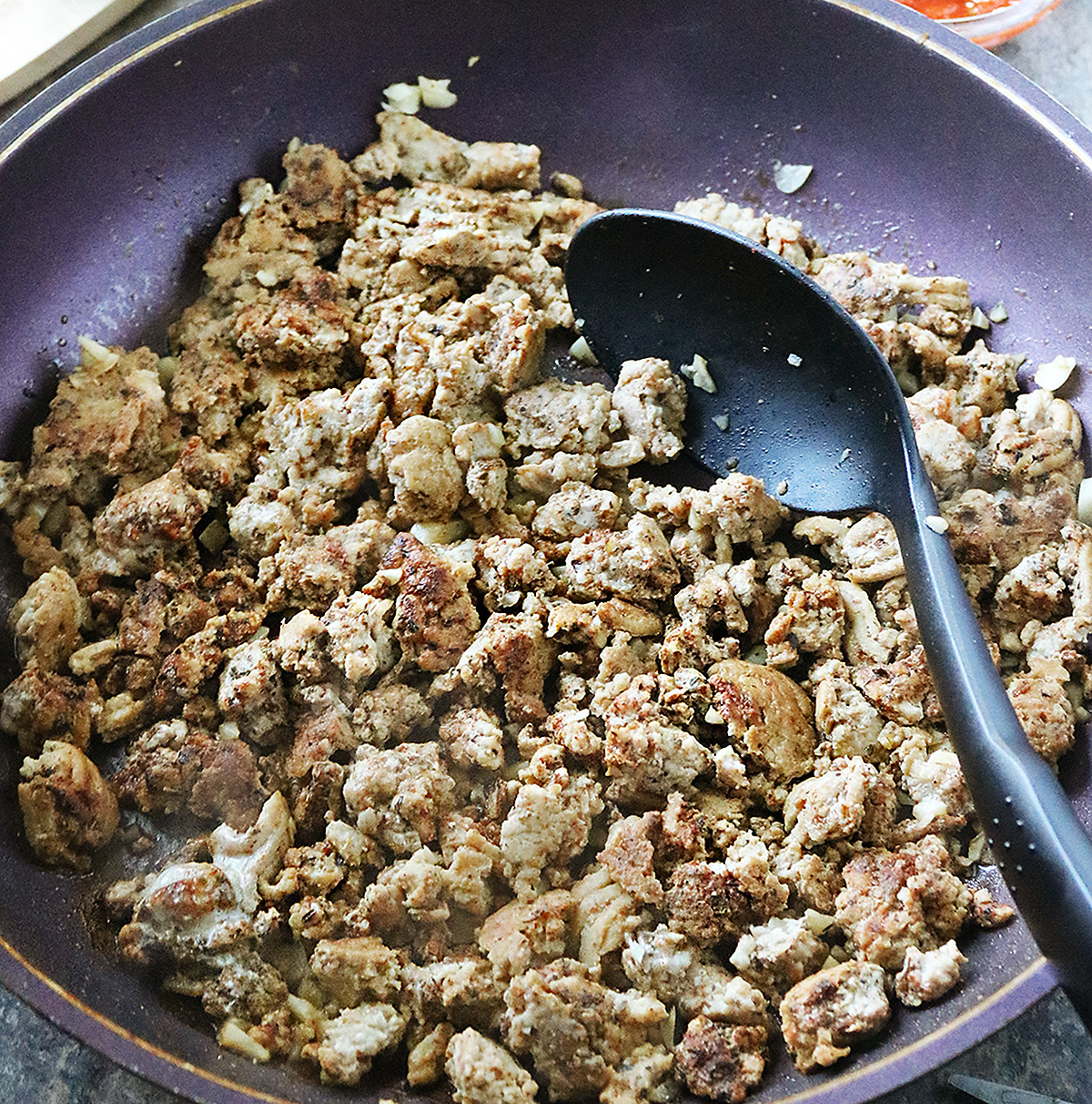 Browning the chicken to use in this stuffed spaghetti squash recipe