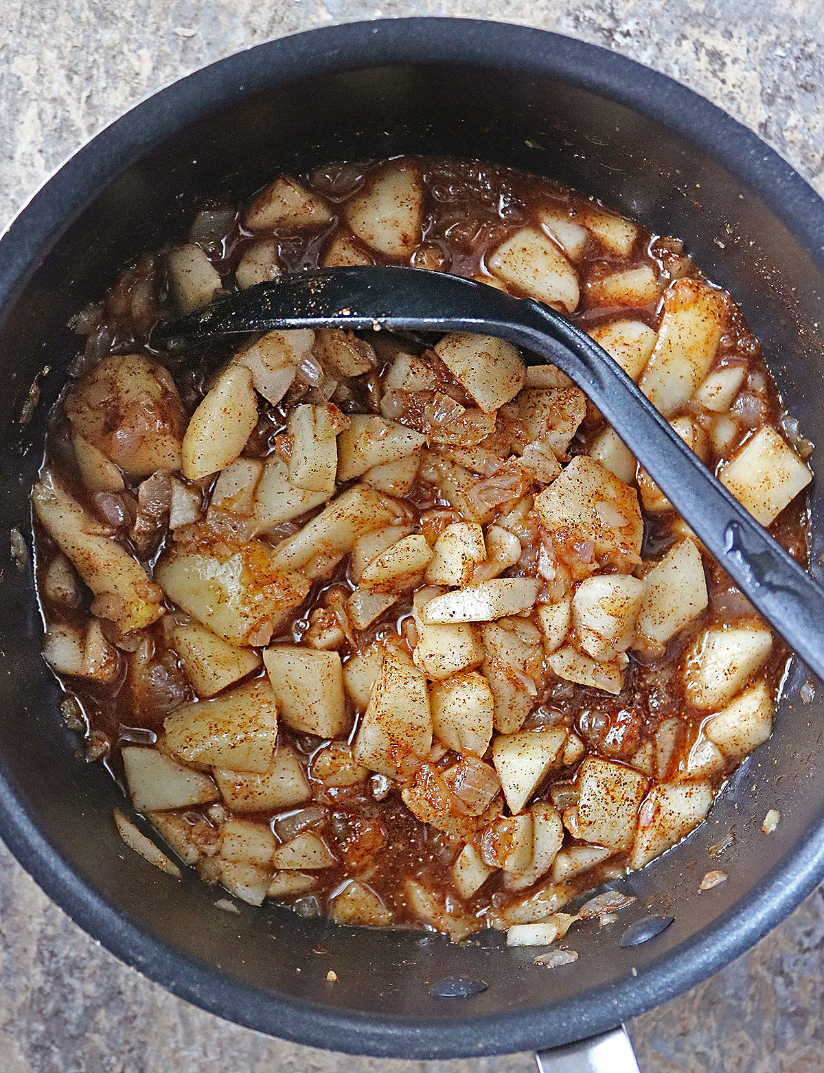 Pears cooking in a tasty vinegar broth