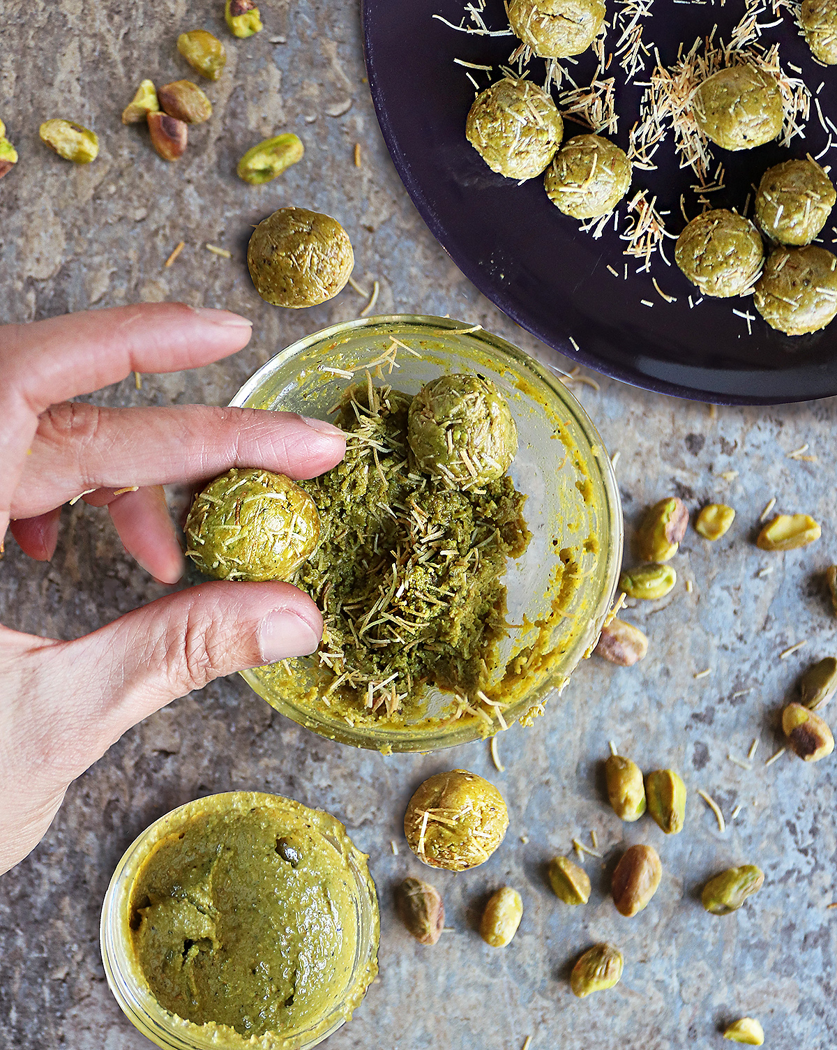 Making Dubai chocolate balls with pistachio butter and ketafi.